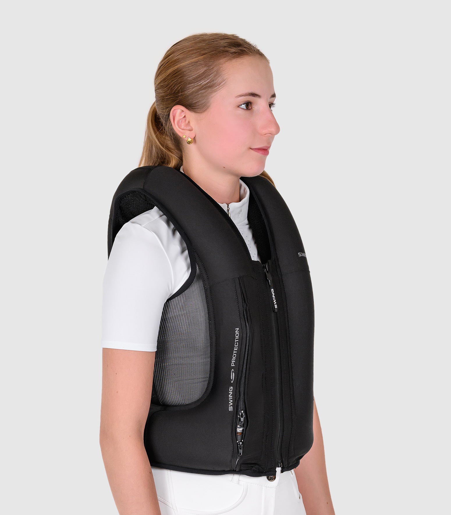 Person wearing a black life vest on a white background